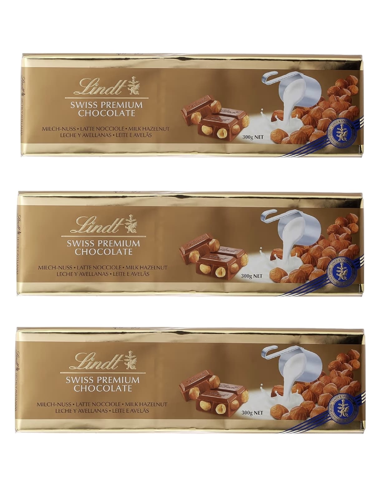 3 x Lindt Tableta de Chocolate con Leche y Avellanas, cremoso y suave, chocolate suizo tradicional, 300 g [También avellanas y pasas]
