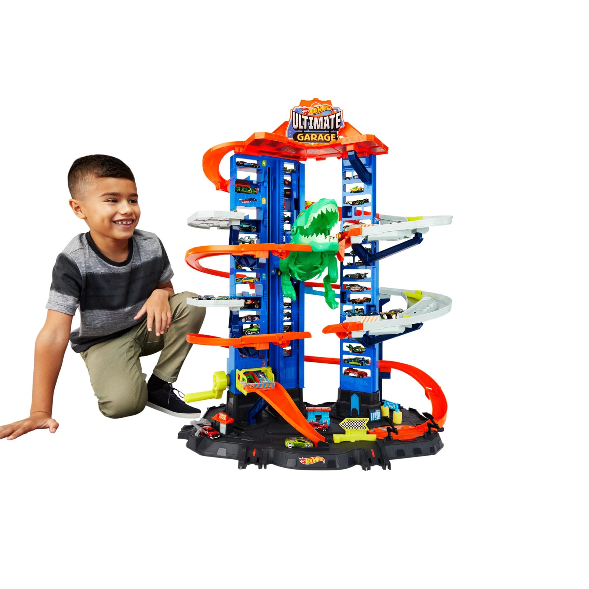 Hot Wheels Ultimate Garage Playset; 2 Coches, Ultimate Garage Playset y 2 Coches Set de pistas con Robo T-Rex, varios niveles para carreras